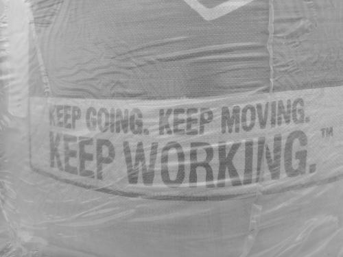 Slogan on giant bag of Quikrete at the Wilmot Elementary construction site.  